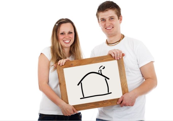 Qualities Of A Good Mortgage Lender-couple holding house picture